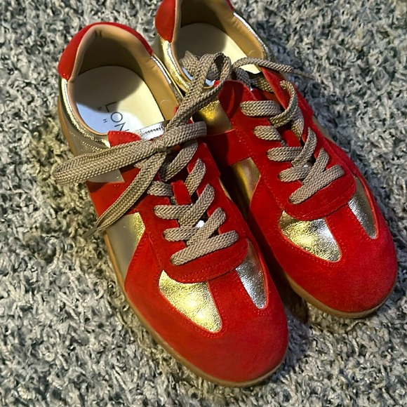 Lonza Shoes - NWOT. Woman’s red and gold Lonza sneakers. Size 40 EU. Suede and faux leather.